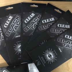 Black tac clear packets spread
